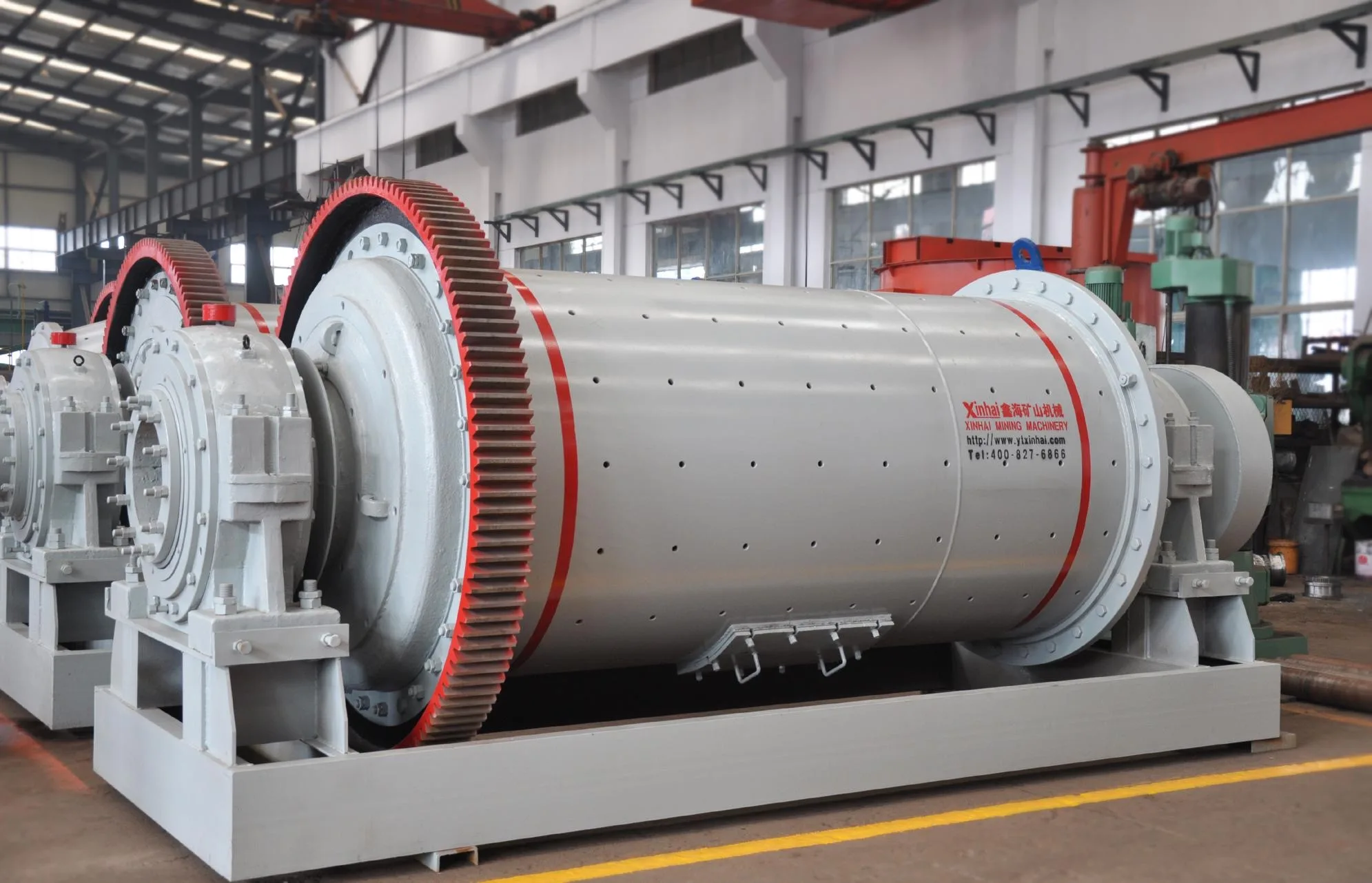 Large Xinhai ball mill inside a mineral equipment workshop